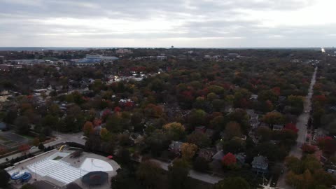 Autumn Residential Neighborhood on a Cloudy Day · Flyover