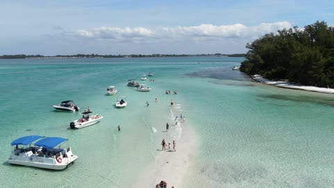 Boats Anchored at a Turquoise Sandbar in Florida