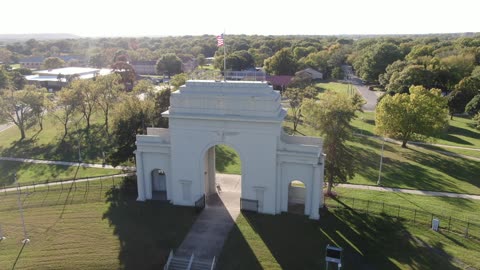 Historic Stone Memorial Arch in Autumn · Orbit
