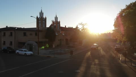 Domed Church Silhouetted Against a Sunset