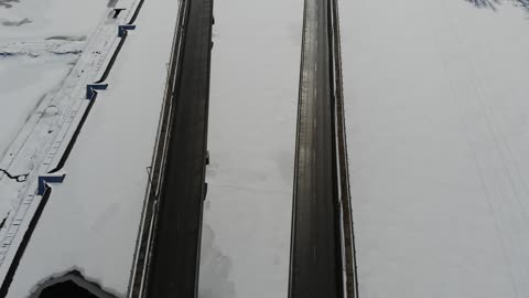 Snowy Fields and Rural Roads in Winter · Black and White Flyover