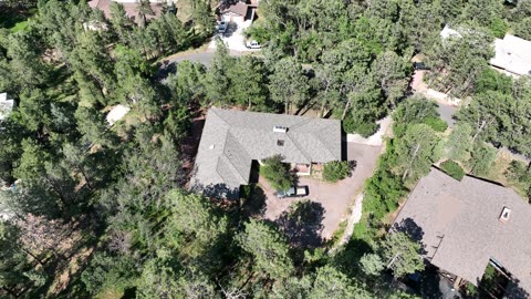 Resort Golf Course and Wooded Hills · Flyover