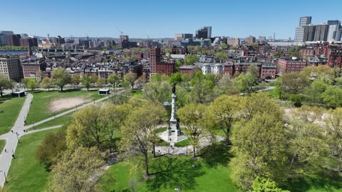 Historic City Park and Skyline in Spring