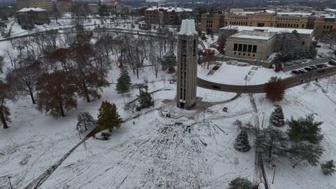 Snow-Covered KU Campanile · Reveal