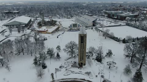 Sledding on Snowy KU Campus