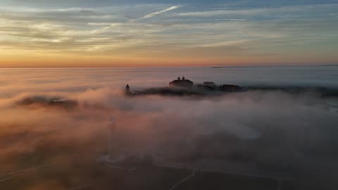 KU Campus Floating Above Morning Fog · Wide