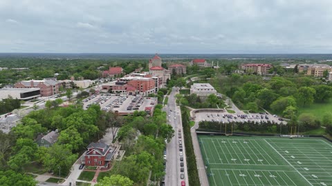 Fraser Hall and the Green KU Campus · Spring