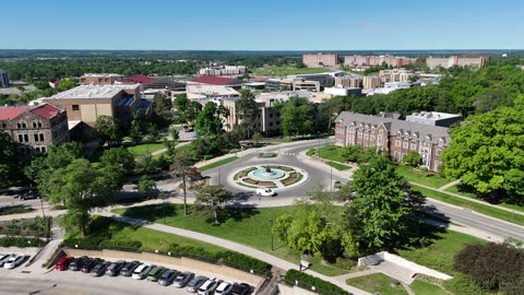 Chi Omega Fountain on the KU Campus · Descent
