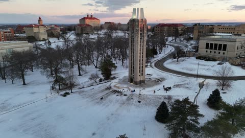 Snowy Sledding Hill on a Winter Afternoon · High Flyover