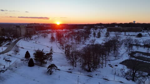 Glowing Winter Sunset Over the KU Campus · Wide