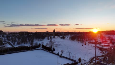 Rise Past the KU Campanile at Golden Winter Sunset