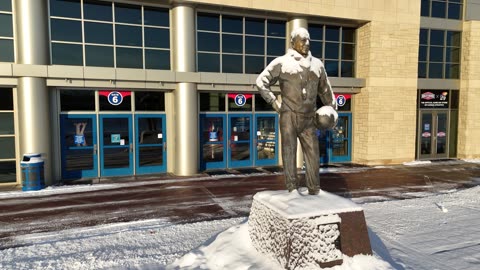 Allen Fieldhouse Entrance and Naismith Statue · Snowy
