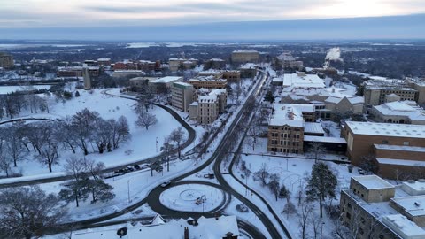 Pan Along Snow-Lined Jayhawk Boulevard Through KU Campus