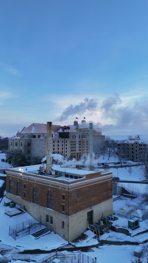 Fraser Hall Through Drifting Campus Steam in Snow