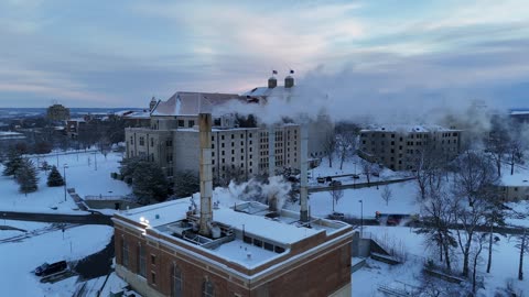 Steam Rising From a Historic KU Campus Building in Snow