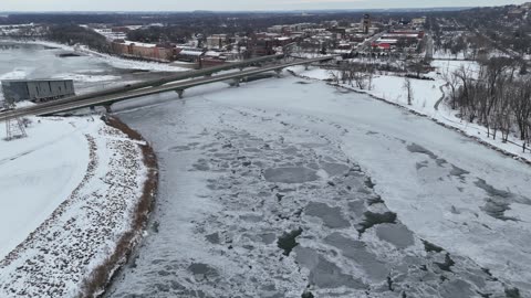 Frozen Kansas River Along Downtown Lawrence · Tracking Shot
