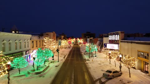 Cruise Above Massachusetts Street at Snowy Winter Dawn