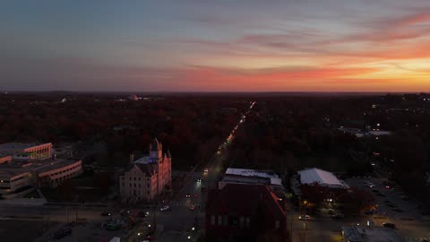 Downtown Lawrence Under a Glowing Orange Sunset