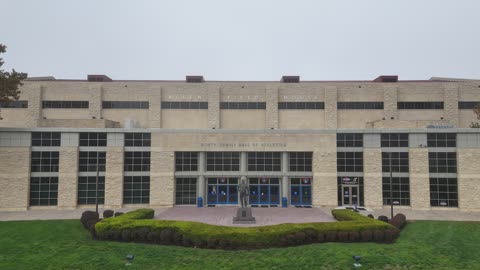 Fog-Shrouded Allen Fieldhouse · Pull-Back