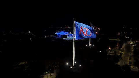 Fraser Hall and Its Illuminated Flags · Night