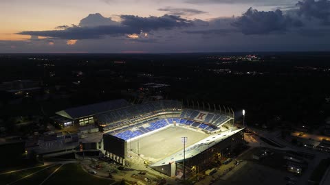 Memorial Stadium Under Dramatic Storm Clouds