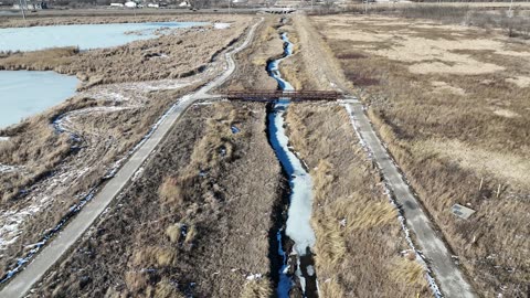 Frozen Channels of Baker Wetlands in Winter · Flyover