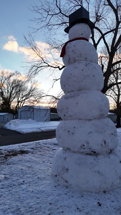Giant Snowman in a Snowy Yard