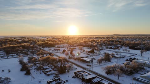View Over Snowy Rooftops at a Cold Winter Sunrise