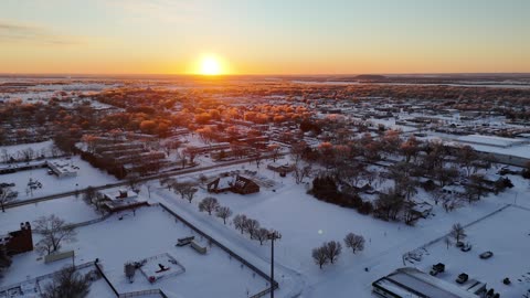 Snow-Blanketed Kansas Town at Winter Sunrise